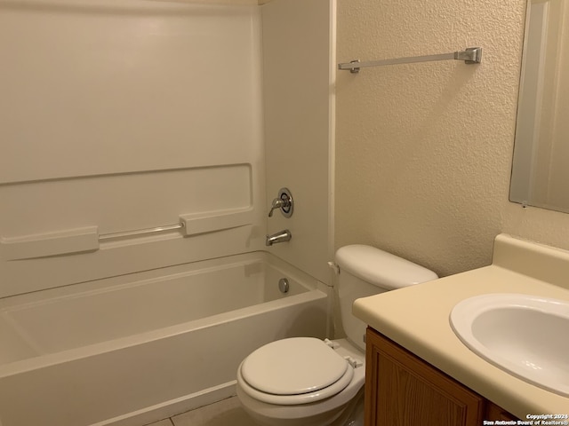 full bathroom featuring vanity, toilet, and  shower combination