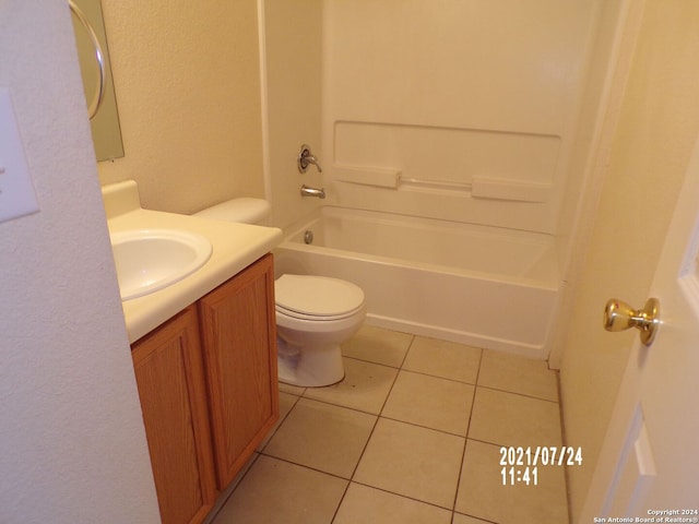 full bathroom featuring tile patterned flooring, vanity, shower / tub combination, and toilet