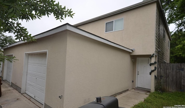 exterior space with a garage