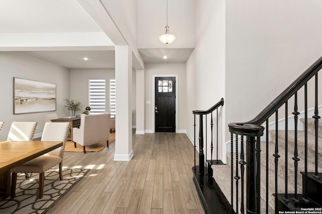 entrance foyer with light wood-type flooring