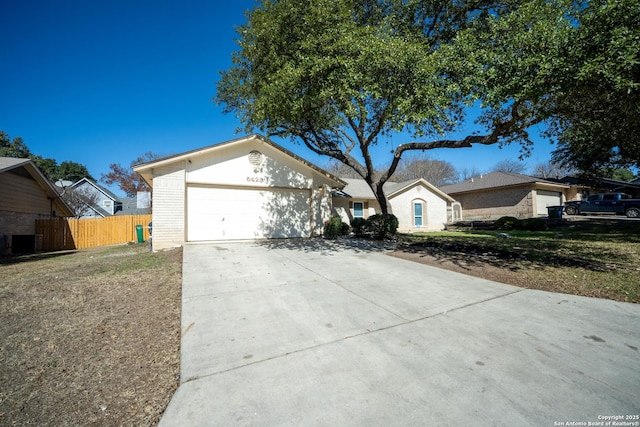 ranch-style home with a garage