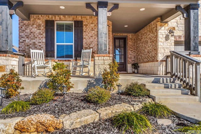 doorway to property with a porch