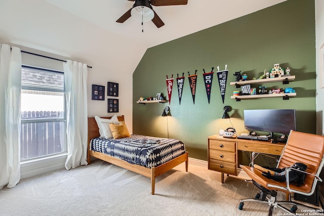 bedroom featuring lofted ceiling, carpet, and ceiling fan