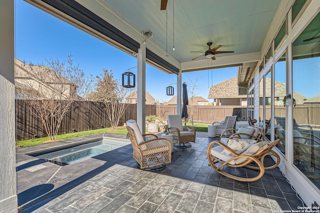 view of patio featuring outdoor lounge area and ceiling fan