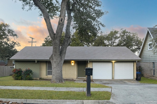 ranch-style home with a garage