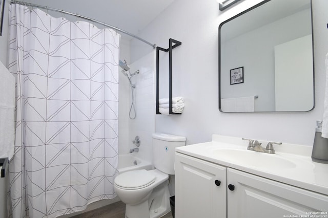 full bathroom with vanity, shower / bath combo, and toilet