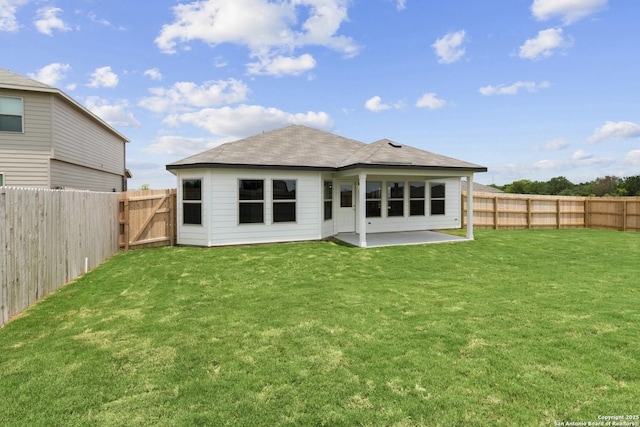 8419 Hamrick Cir, San Antonio, TX 78252 - back of property with a patio, a fenced backyard, and roof with shingles
