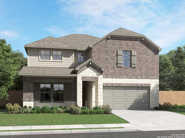 view of front of home with a garage and a front yard