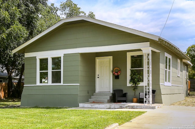 bungalow with a front yard