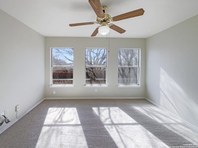 unfurnished room with light colored carpet