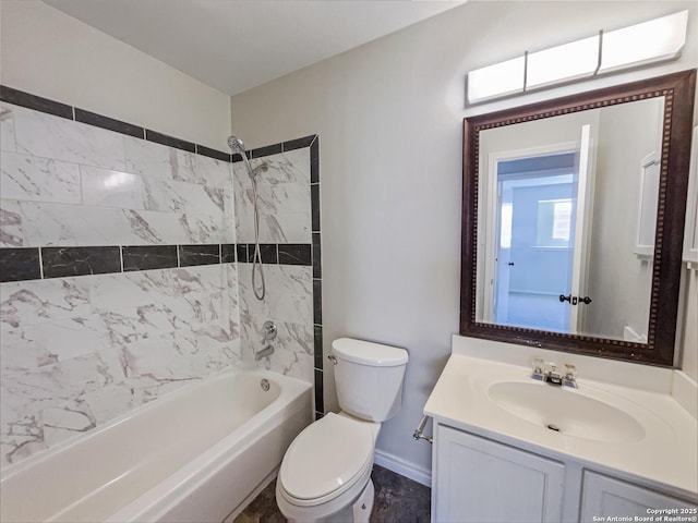 full bathroom with vanity, tiled shower / bath combo, and toilet