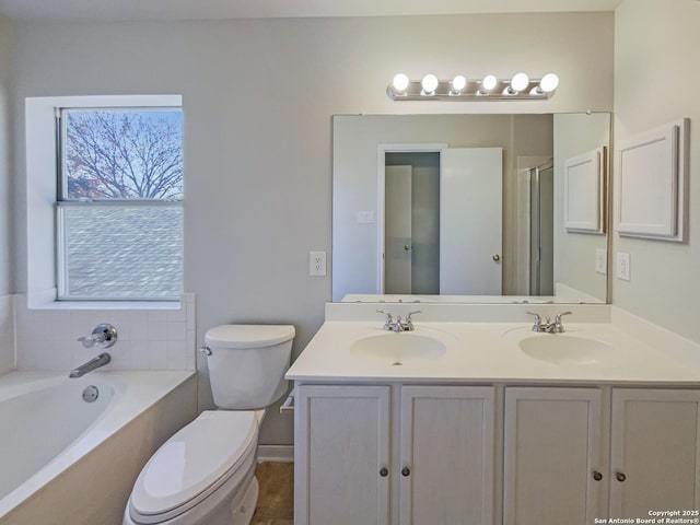 full bathroom with toilet, vanity, and shower with separate bathtub