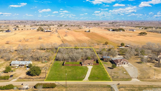 birds eye view of property featuring a rural view