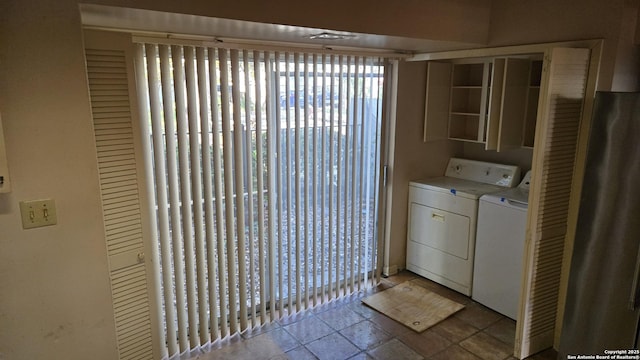 laundry room with washer and dryer