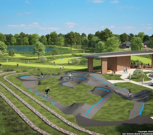 surrounding community with a yard