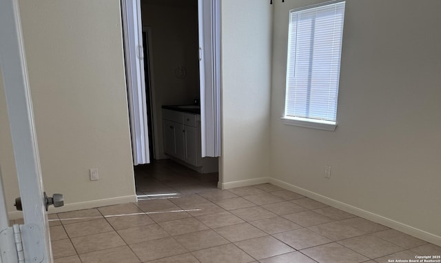 view of tiled spare room