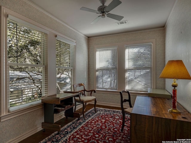 office space with ceiling fan, a healthy amount of sunlight, ornamental molding, and hardwood / wood-style flooring