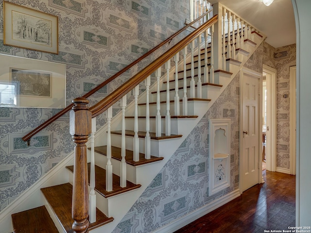 stairway with wood-type flooring