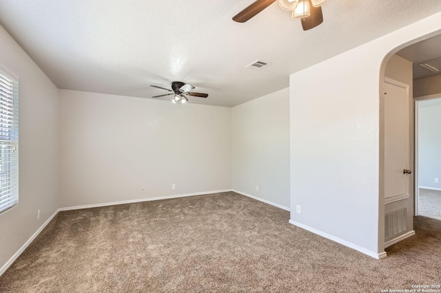 11618 Fort Smith, San Antonio, TX 78245 - unfurnished room with carpet, arched walkways, a ceiling fan, visible vents, and baseboards
