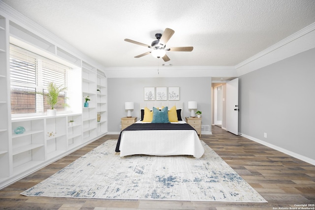 bedroom featuring crown molding, ceiling fan, dark hardwood / wood-style flooring, and a textured ceiling