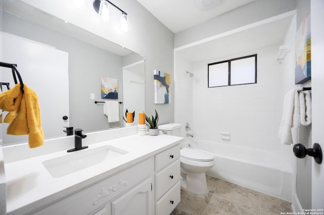 full bathroom featuring vanity, toilet, and tiled shower / bath combo