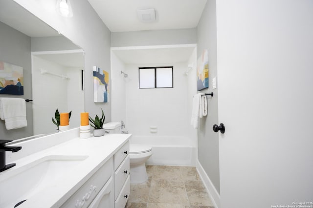 full bathroom with vanity, tiled shower / bath, and toilet