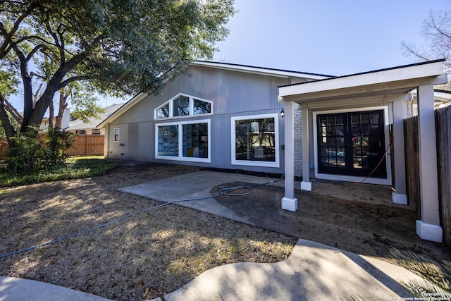 rear view of house featuring a patio area