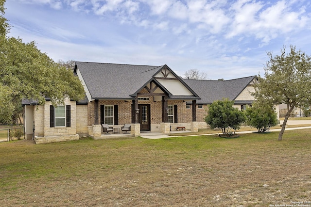 view of front facade featuring a patio area and a front lawn