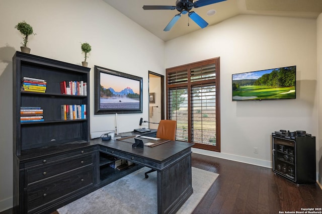 office space with dark wood-style floors, ceiling fan, lofted ceiling, and baseboards