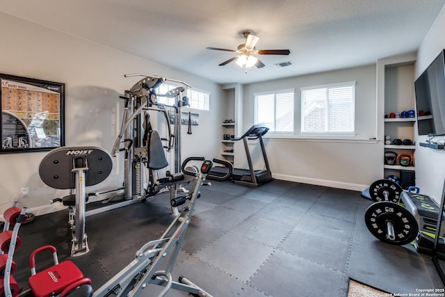 workout room with ceiling fan