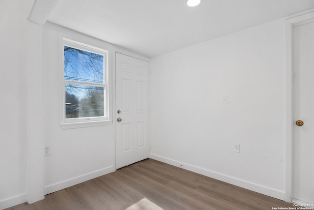 spare room with light hardwood / wood-style flooring