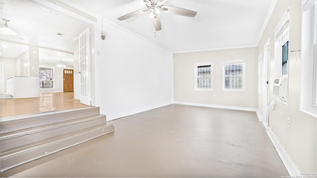 interior space featuring ornamental molding, concrete floors, and ceiling fan