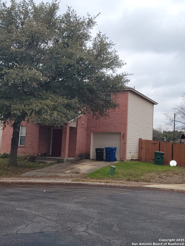 view of side of property with a garage