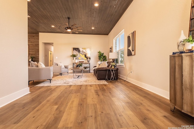 corridor with wood ceiling and light hardwood / wood-style floors