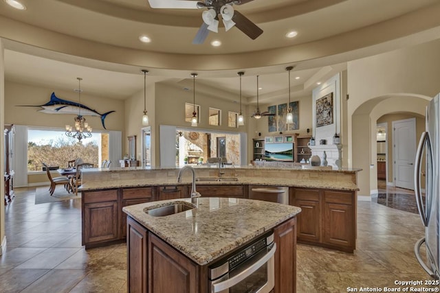 kitchen featuring sink, pendant lighting, and a large island