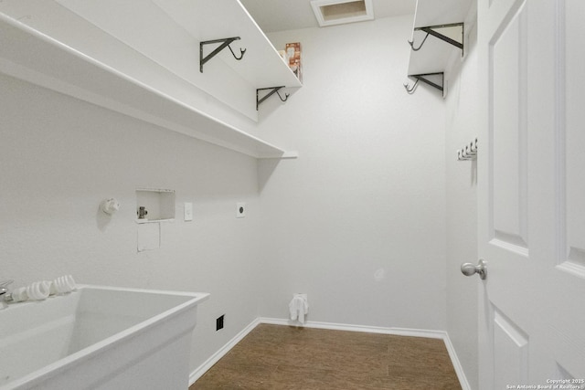 clothes washing area with gas dryer hookup, hookup for a washing machine, and electric dryer hookup