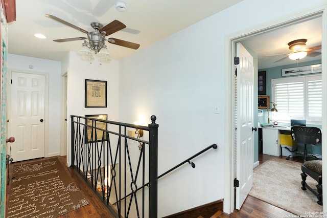 corridor with dark hardwood / wood-style floors