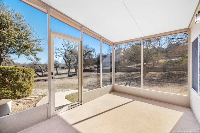 unfurnished sunroom featuring a healthy amount of sunlight