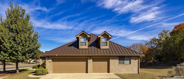 view of front of property with a garage