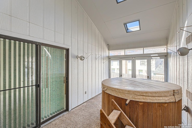 sunroom / solarium with lofted ceiling