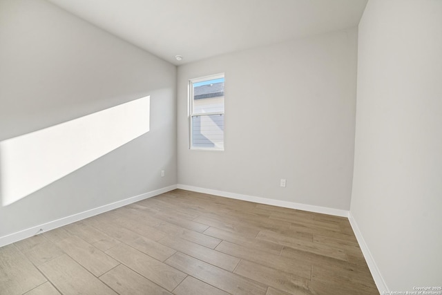 211 Ryan Xing, San Antonio, TX 78253 - spare room featuring wood finished floors and baseboards