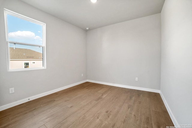 211 Ryan Xing, San Antonio, TX 78253 - spare room featuring wood finished floors and baseboards