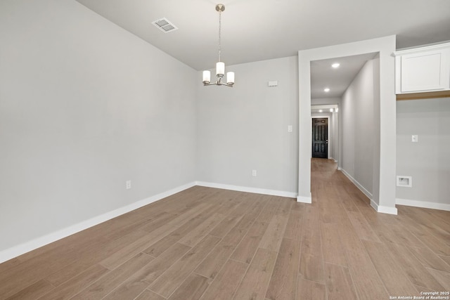 211 Ryan Xing, San Antonio, TX 78253 - empty room featuring light wood-style floors, a chandelier, baseboards, and recessed lighting