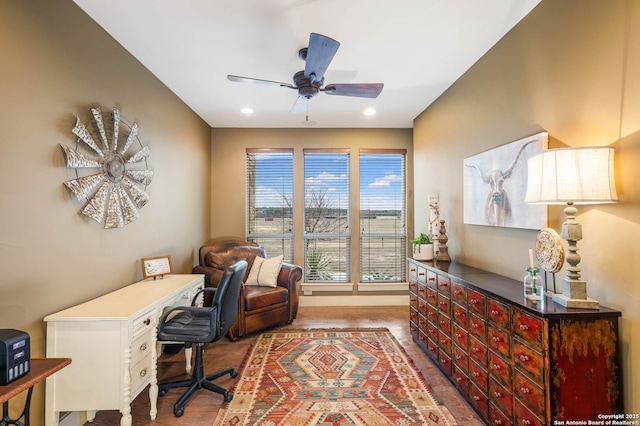 office with ceiling fan and recessed lighting