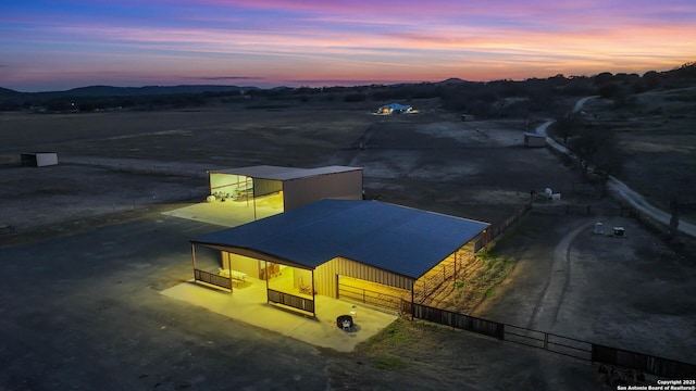 drone / aerial view featuring a mountain view