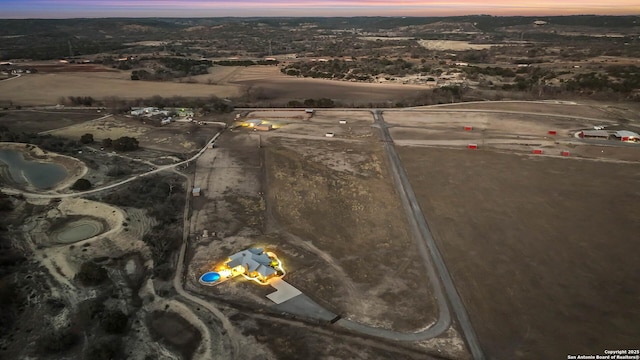 view of aerial view at dusk