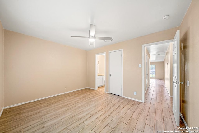 unfurnished room featuring light hardwood / wood-style flooring and ceiling fan