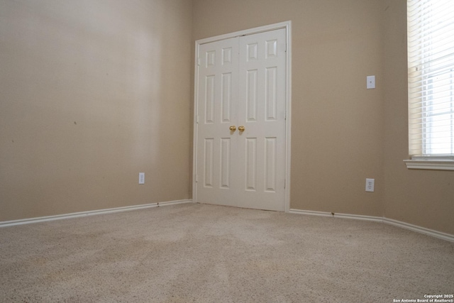 empty room featuring carpet