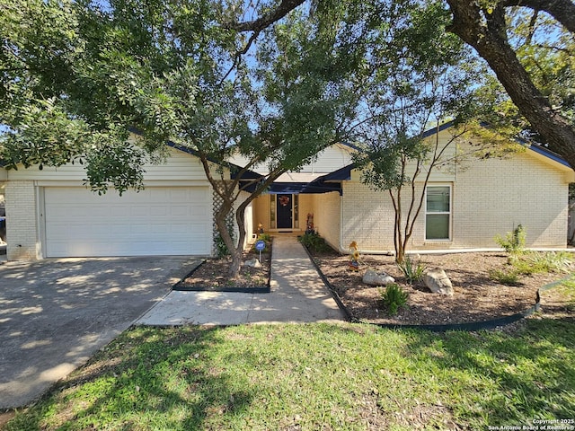 single story home featuring a garage