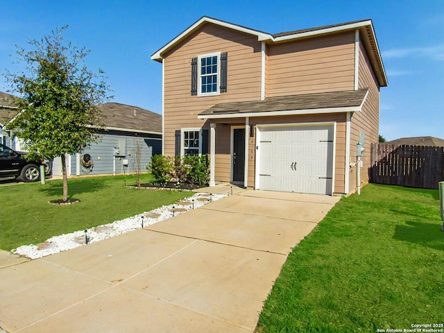 view of front of property featuring a garage and a front yard